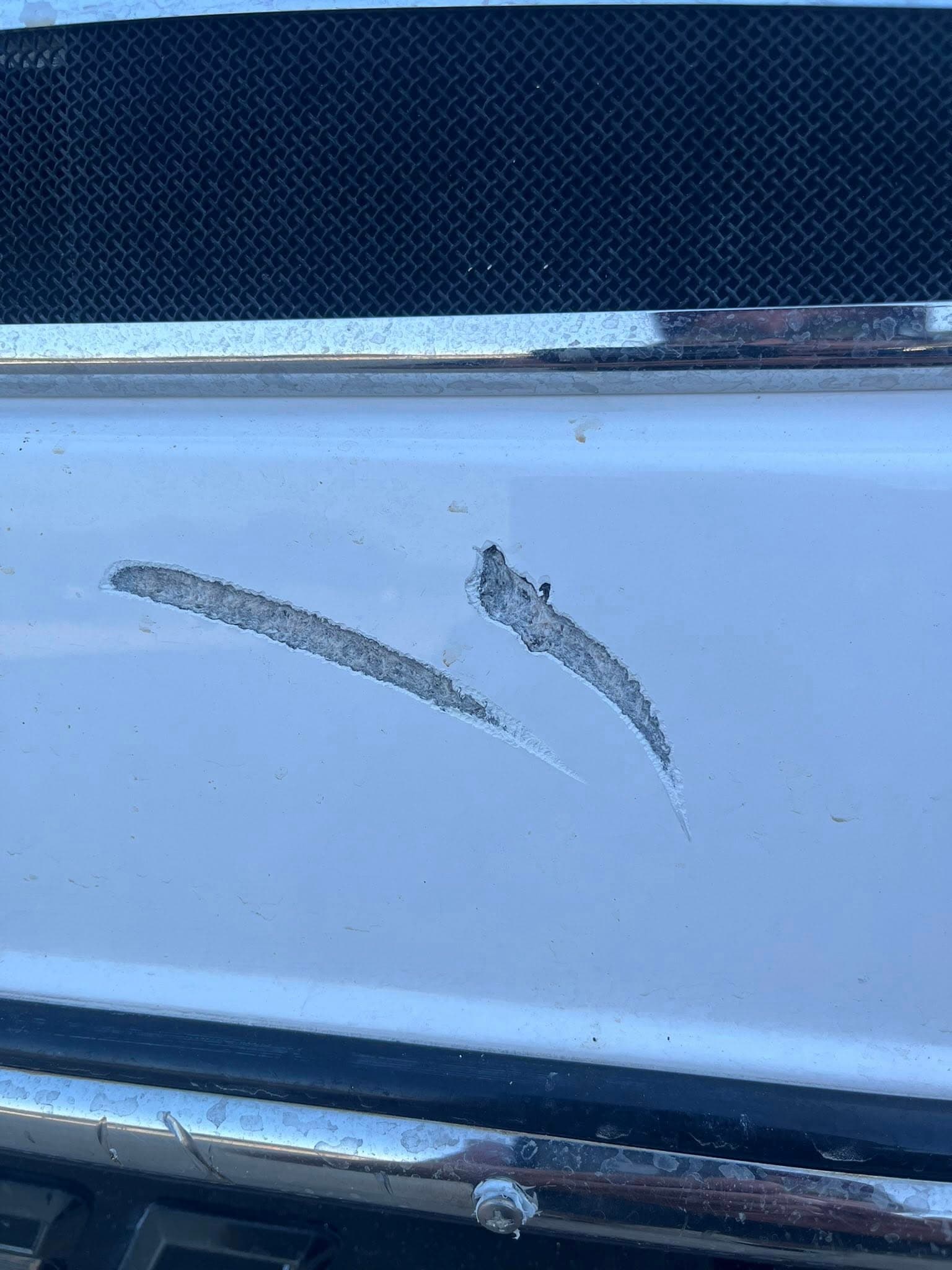 Malibu back right scratch repair photo 1